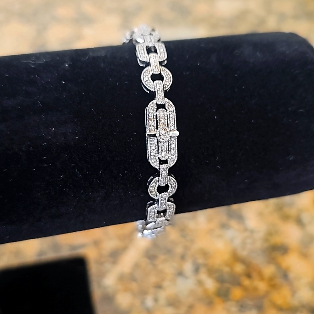 Beautiful rhodium plated sterling silver and cz link bracelet